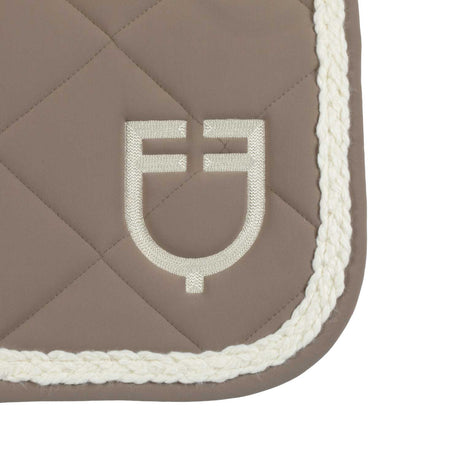Braided cord jumping saddle pad